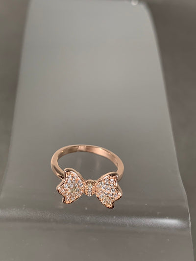 Pave Set Cubic Zirconia Bow Ring in Rose Gold Tone with Sizes