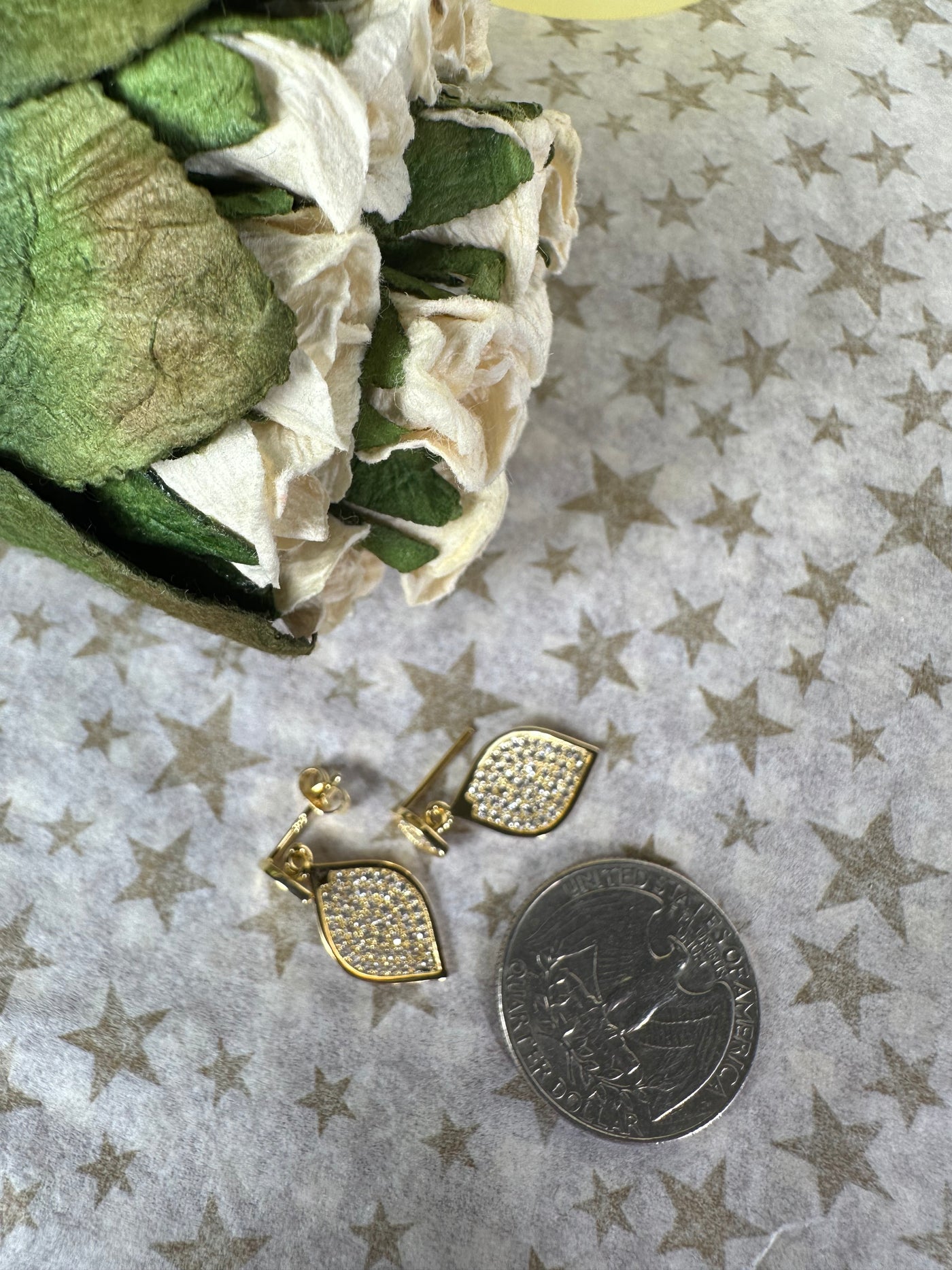 Yellow Gold Tone Pave Set Cubic Zirconia Dangling Leaf Earrings