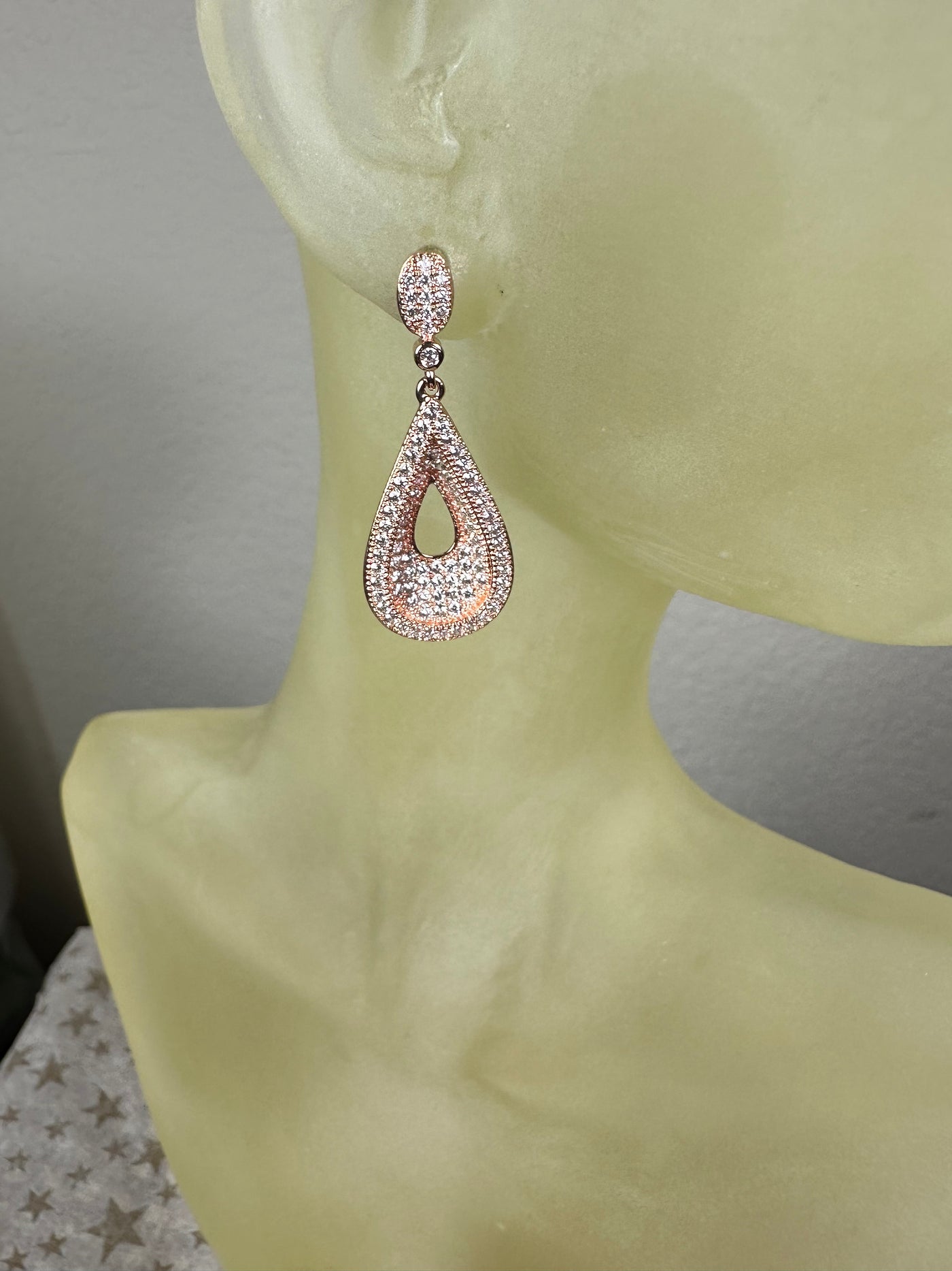 Rose Gold Tone Pave Set Cubic Zirconia Raised Rim Cut Out Tear Shape Dangling Earrings