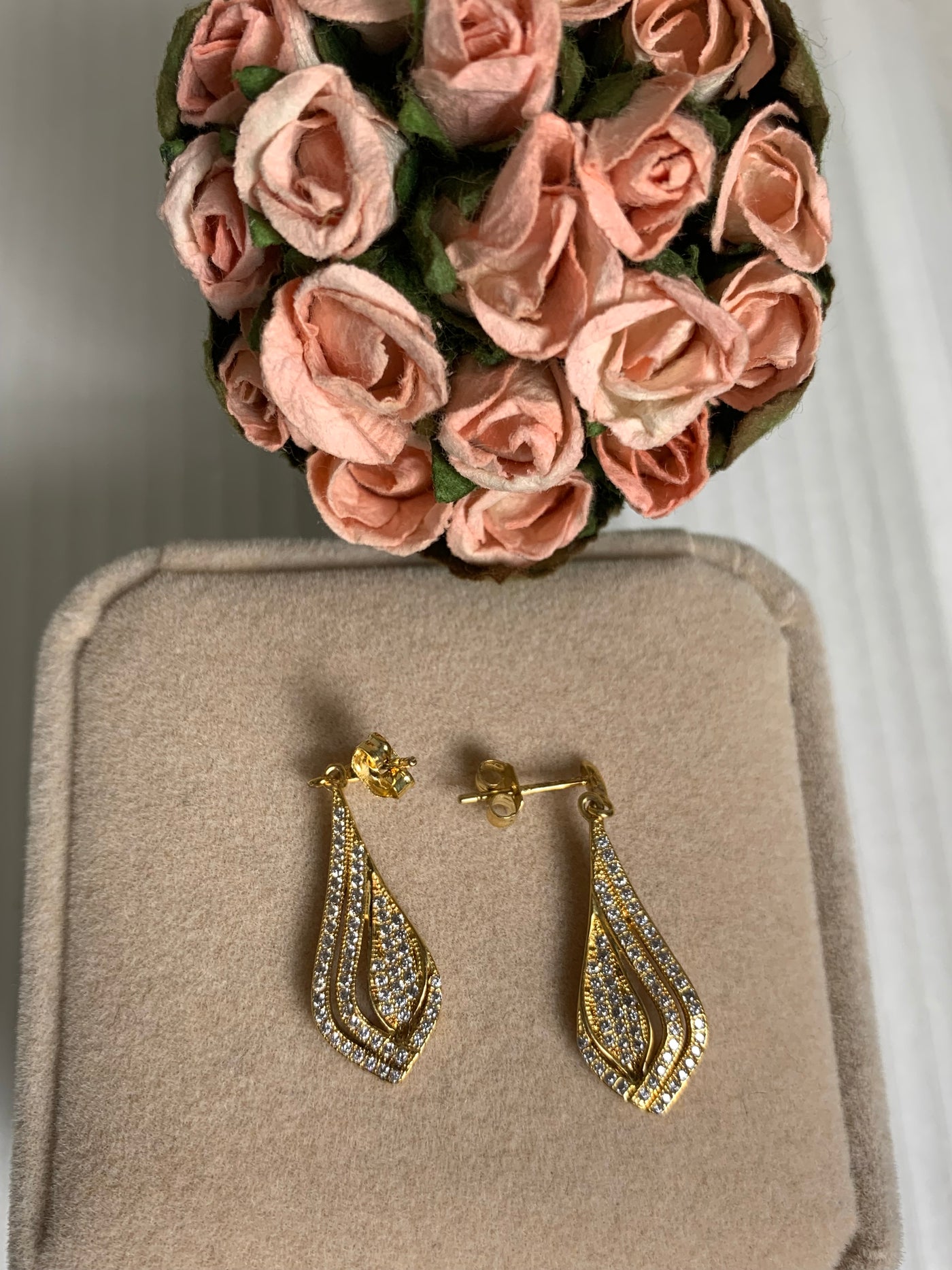 Rose Gold Tone Dangling Earrings Decorated with Pave Set Cubic Zirconia