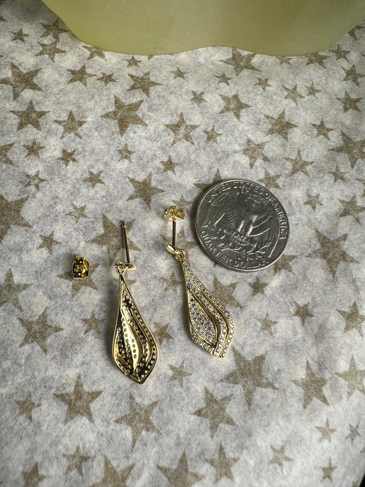 Yellow Gold Tone Dangling Earrings Decorated with Pave Set Cubic Zirconia