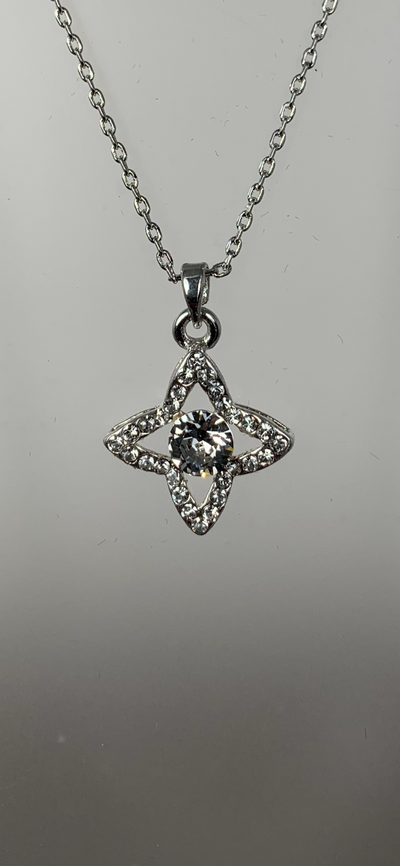 Silver Tone Four Pointed Crystal Pendant Necklace