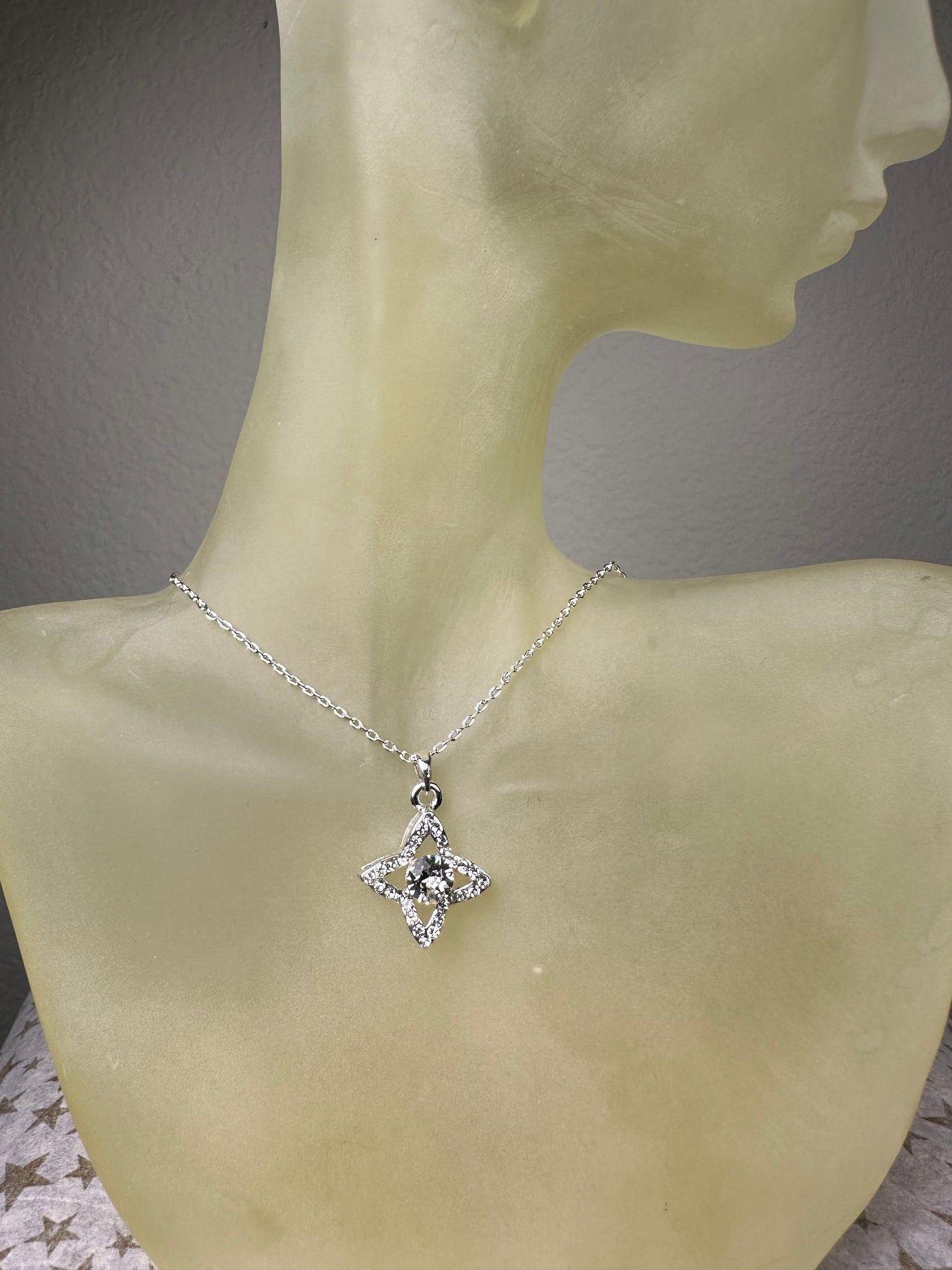 Silver Tone Four Pointed Crystal Pendant Necklace