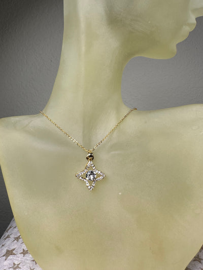 Yellow Gold Tone Four Pointed Crystal Pendant Necklace