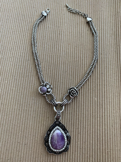 Silver Tone Necklace Featuring a Howlite Amethyst Pendant