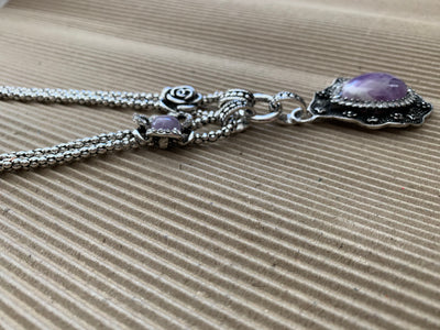 Silver Tone Necklace Featuring a Howlite Amethyst Pendant