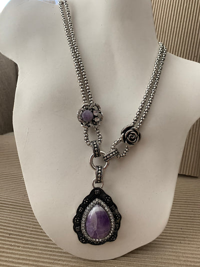 Silver Tone Necklace Featuring a Howlite Amethyst Pendant