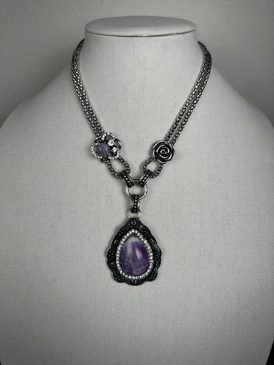 Silver Tone Necklace Featuring a Howlite Amethyst Pendant