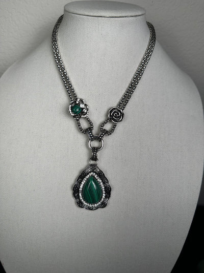 Silver Tone Necklace Featuring an Ornate Malachite Howlite Drop