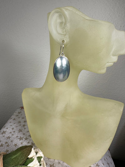 Sterling Silver and Elongated Dome Oval Lt. Green Shell Dangling Earrings