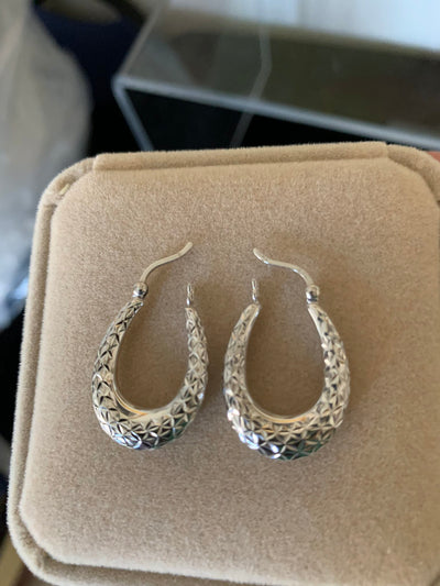 Solid 14K White Gold Oval Hoop Earrings with Diamond Cut Design