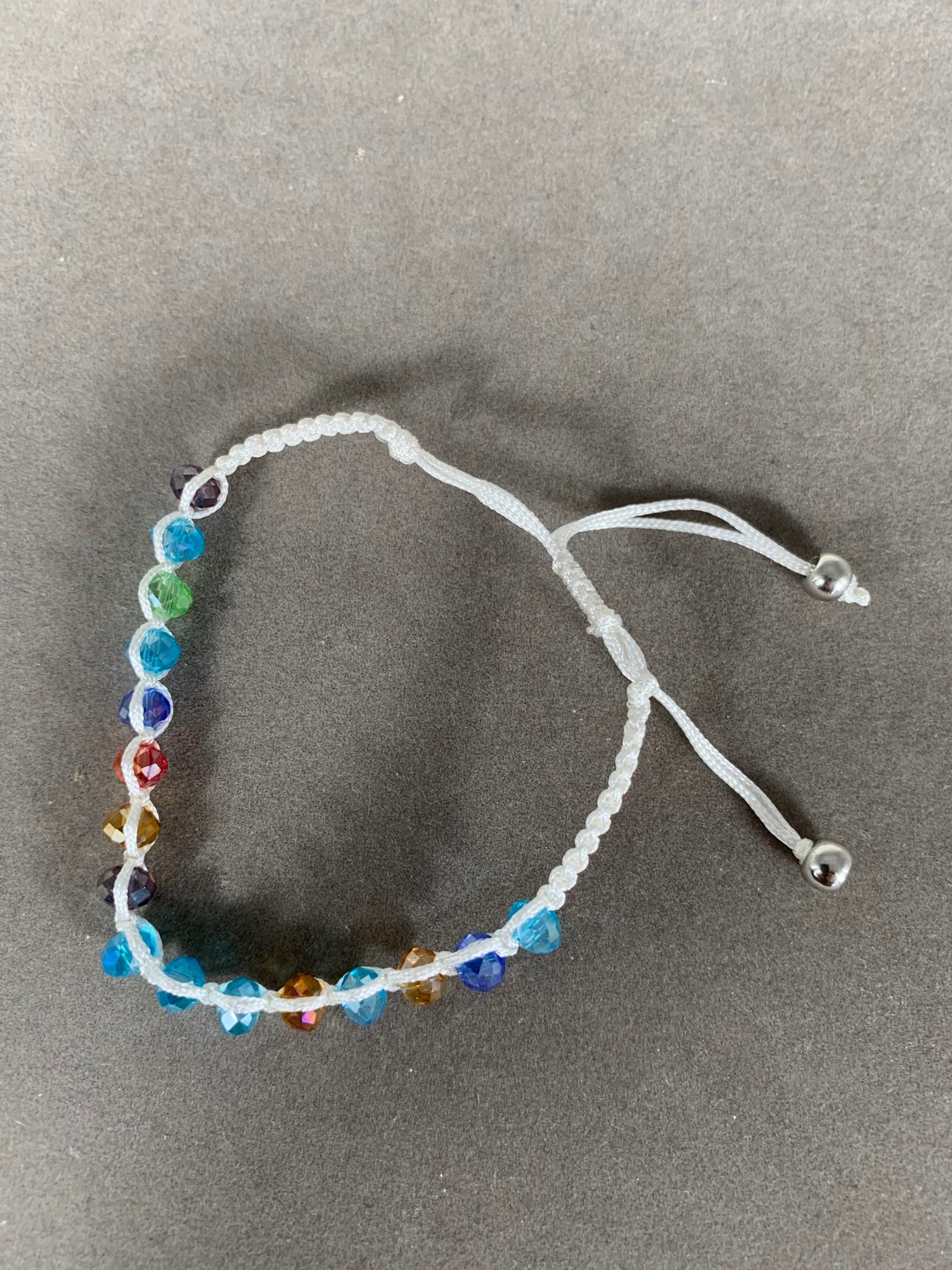 White Braided Bracelet Featuring Crystal Beads