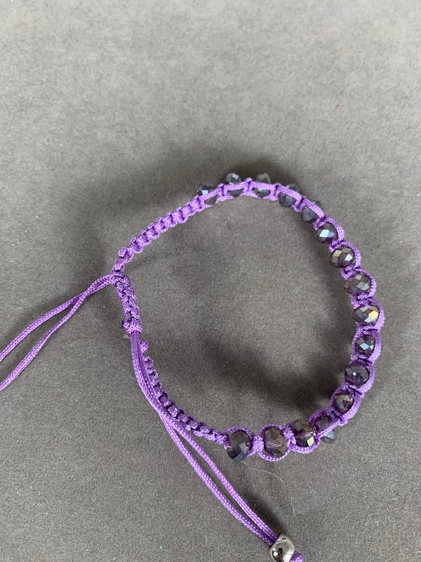 Purple Braided Bracelet Featuring Crystal Beads