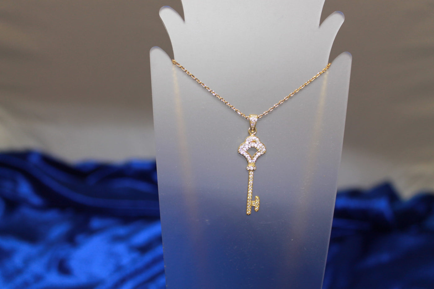 Pave Set Cubic ZirconiaPave Set Cubic Zirconia Dainty Key Pendant Necklace in Yellow Gold Tone