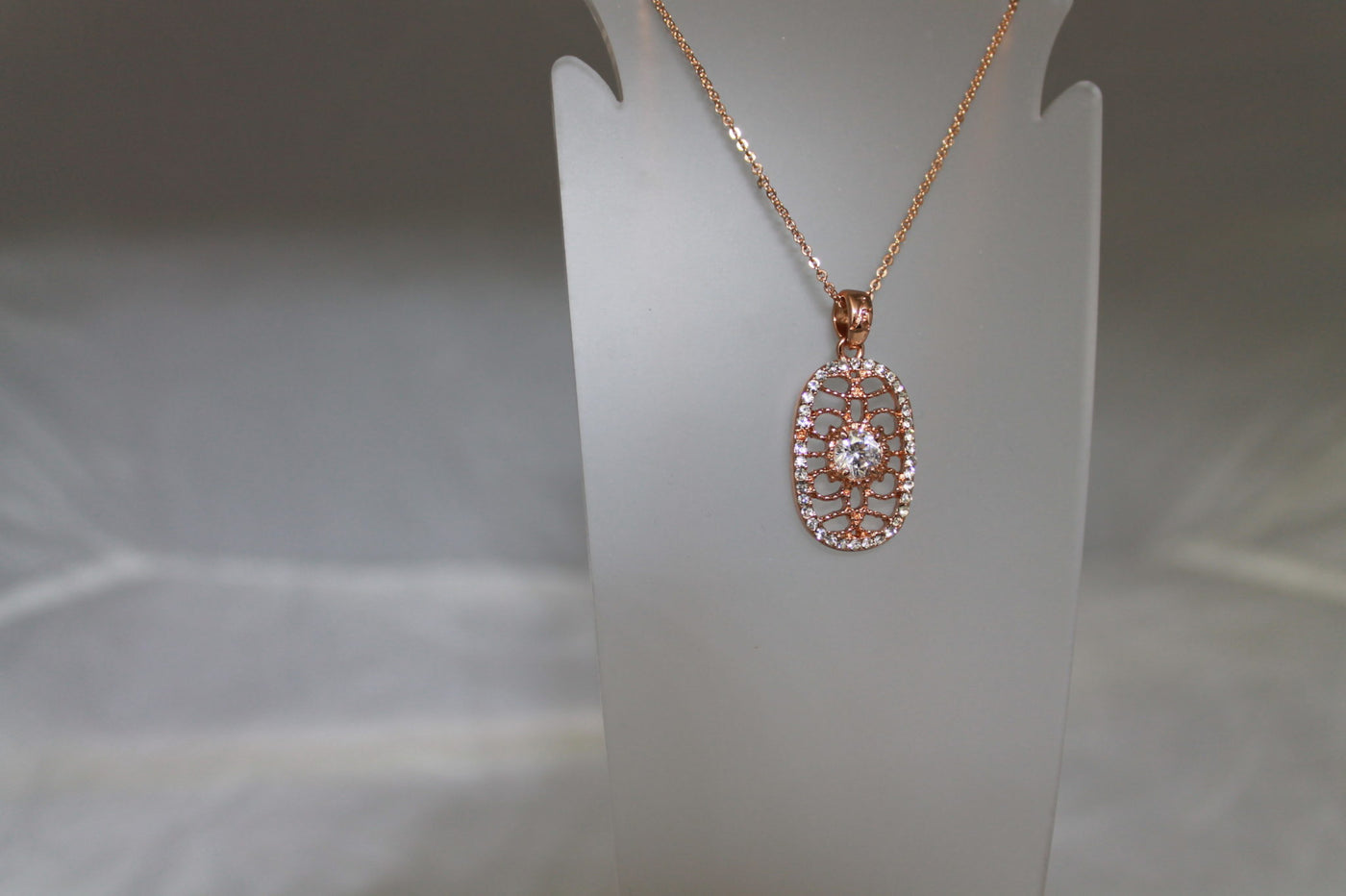 Rose Gold Tone Necklace with a filigree pendant