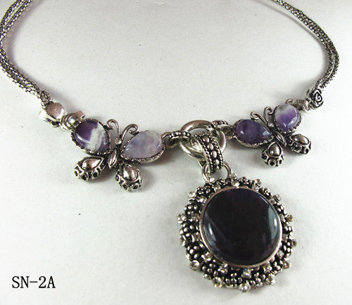 Silver Tone Ornate Necklace Decorated with Round Amethyst and Crystals