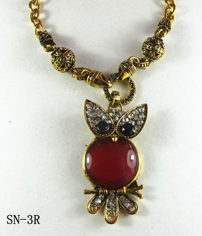 Gold Tone Necklace with a Red-Orangy Carnelian Owl Pendant