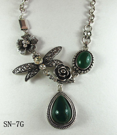 Silver Tone Necklace Featuring a Dragonfly Theme