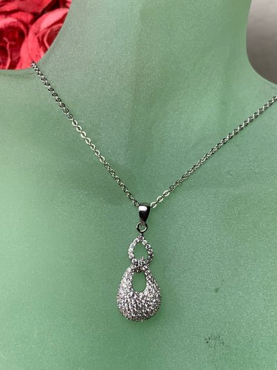 "Smaller" Pave Set Intertwined Loops Cubic Zirconia Pendant