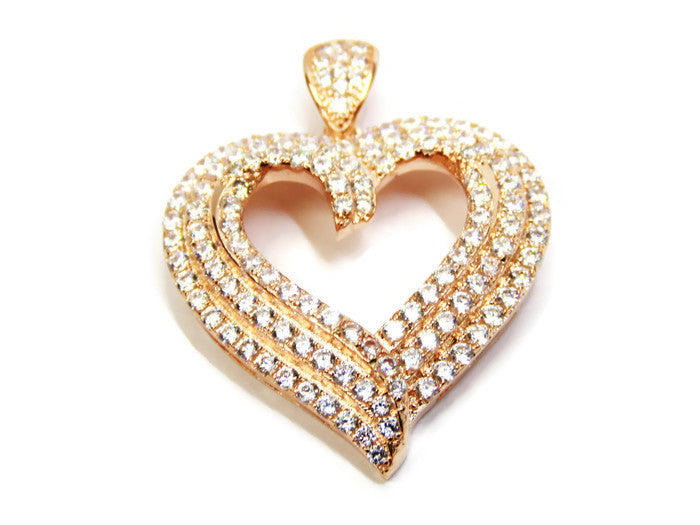 Rose Gold Tone Heart Pendant Decorated with Pave Set Cubic Zirconia