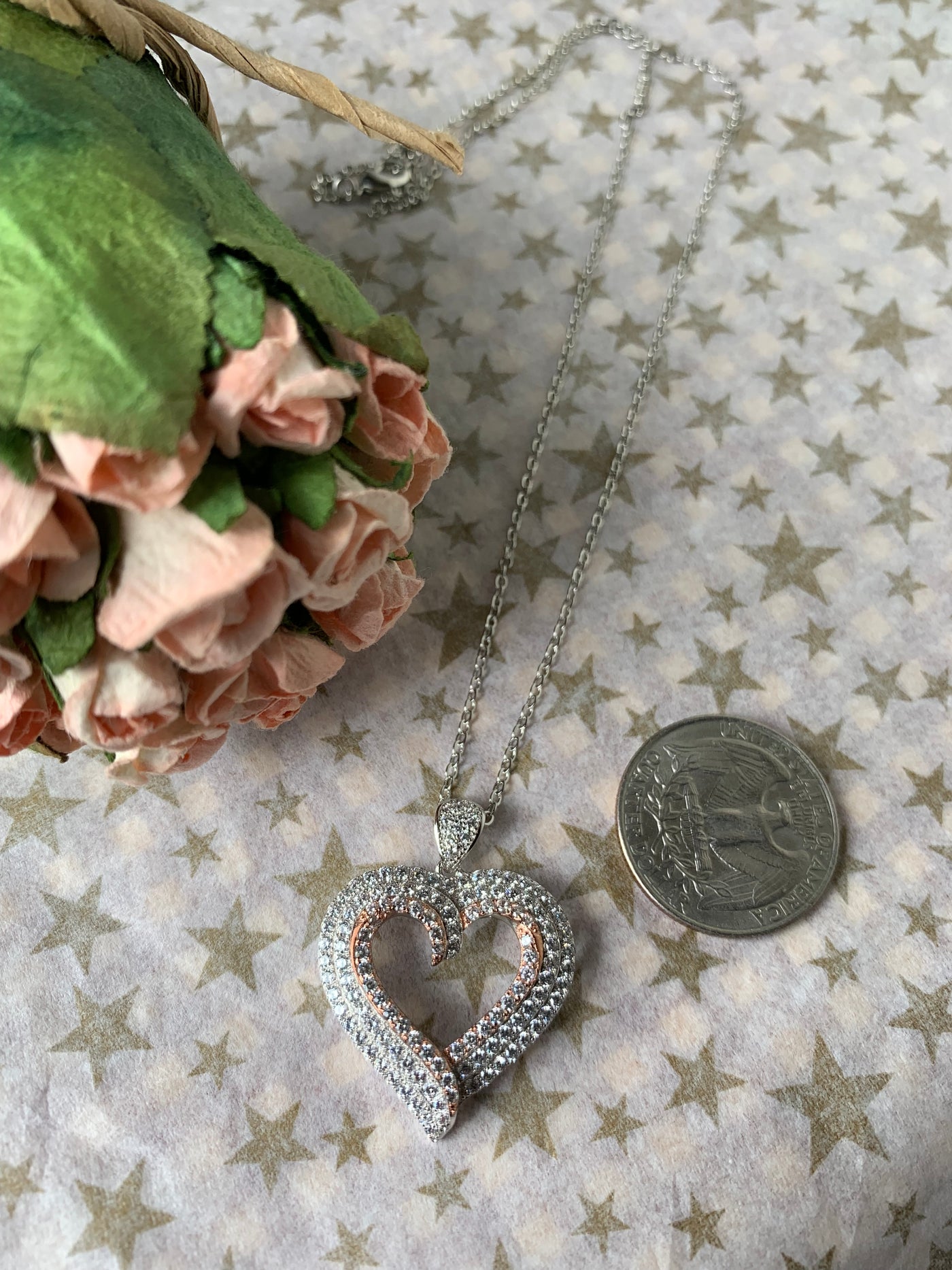Cut Out Heart Pendant Decorated with Pave Set Cubic Zirconia