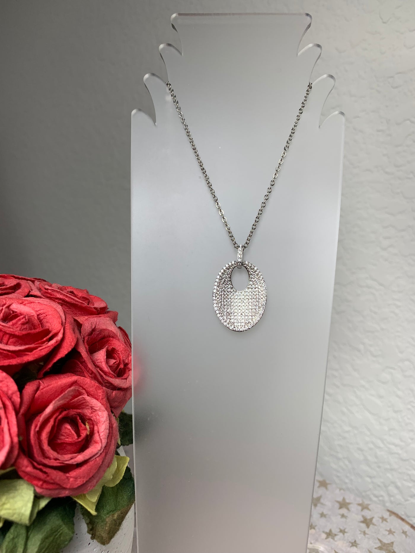 Concaved Oval Shape Pendant Decorated with Cubic Zirconium