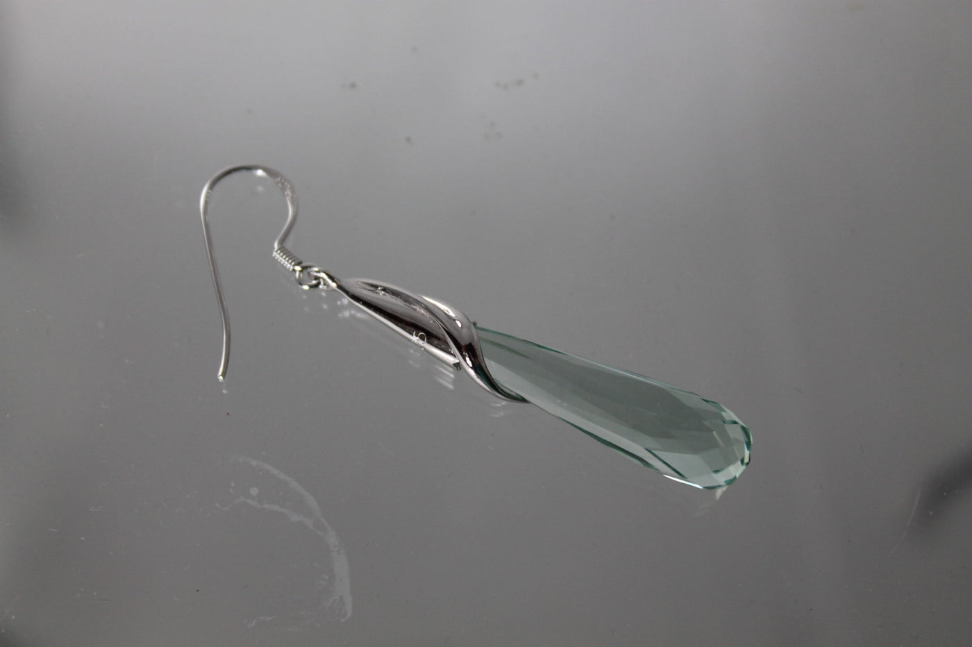 Light Green Cubic Zirconia and Sterling Silver Dangling Earrings