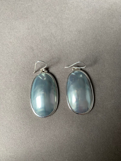 Sterling Silver and Elongated Dome Oval Lt. Green Shell Dangling Earrings