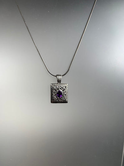 Sterling Silver Filigree Pendant with Purple CZ