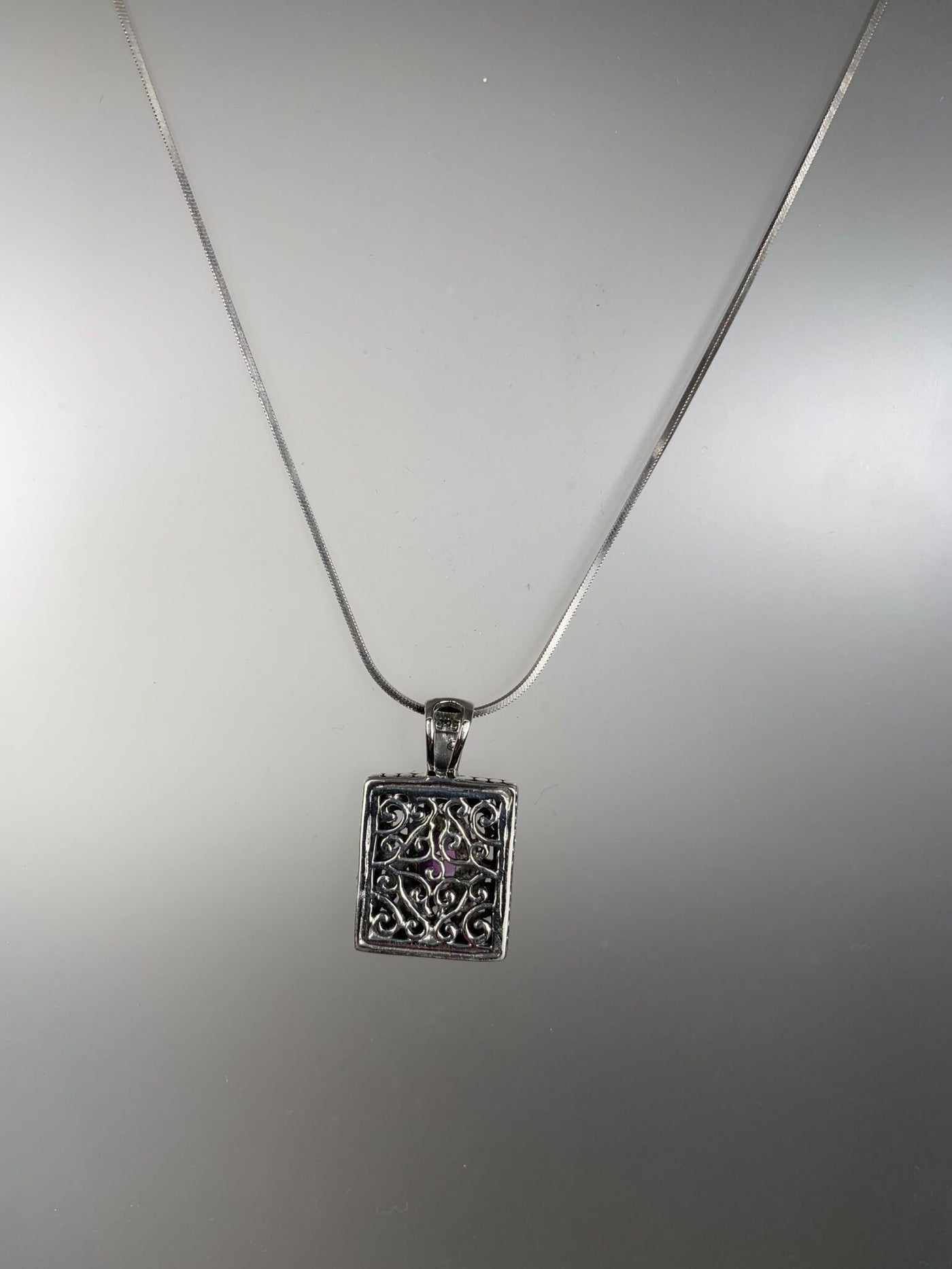 Sterling Silver Filigree Pendant with Purple CZ