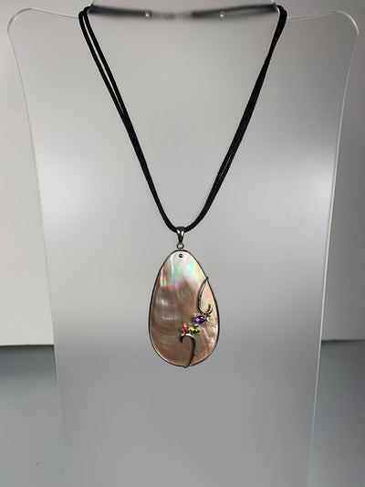 Sterling Silver and Brown Shell Pendant with Gems