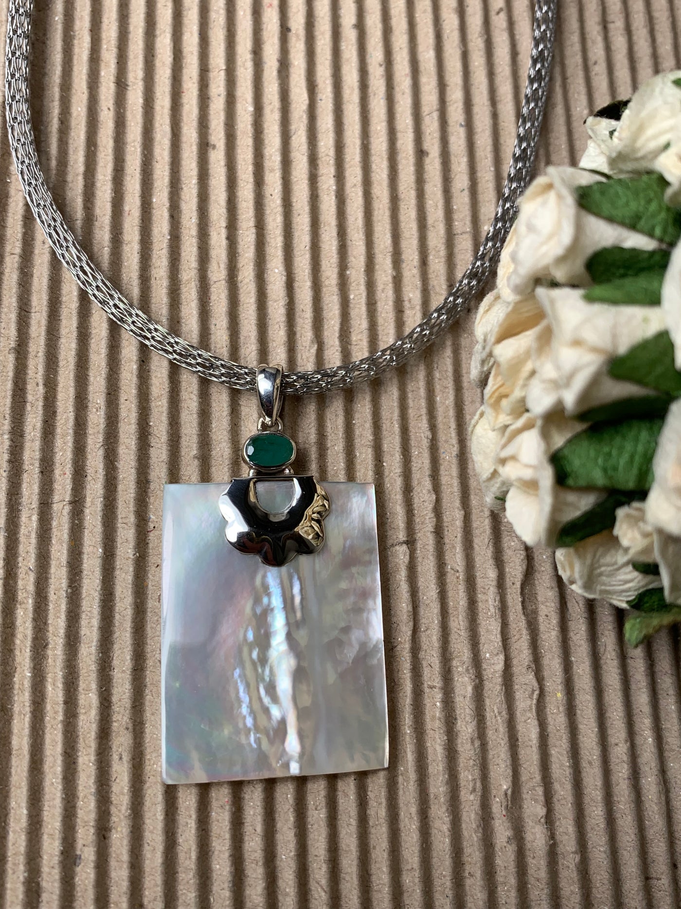 Natural White Shell Pendant with Green Stone Accent in Sterling Silver