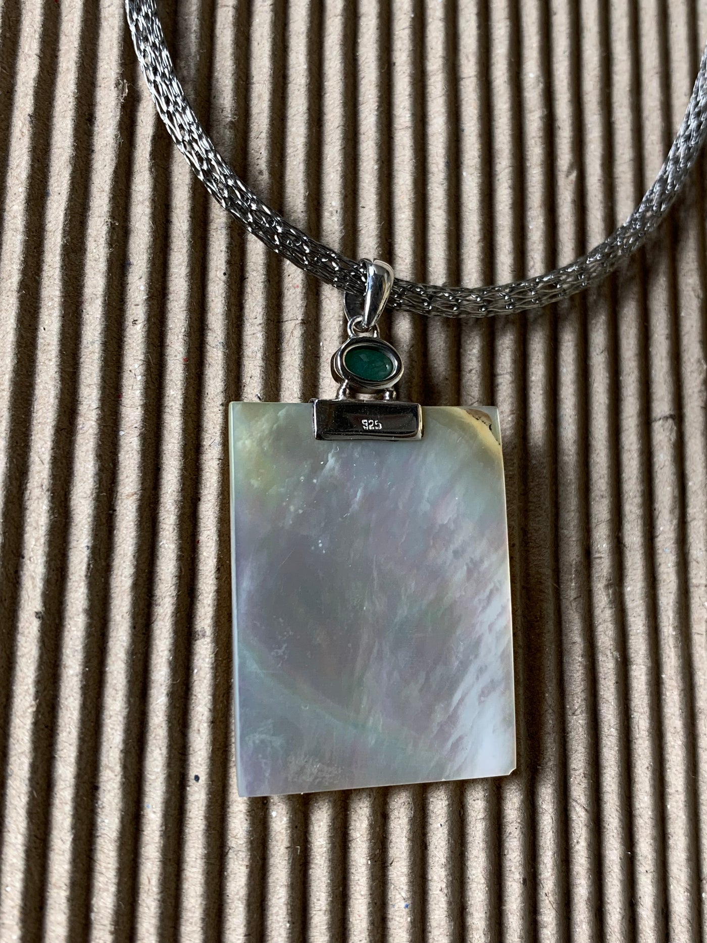 Natural White Shell Pendant with Green Stone Accent in Sterling Silver