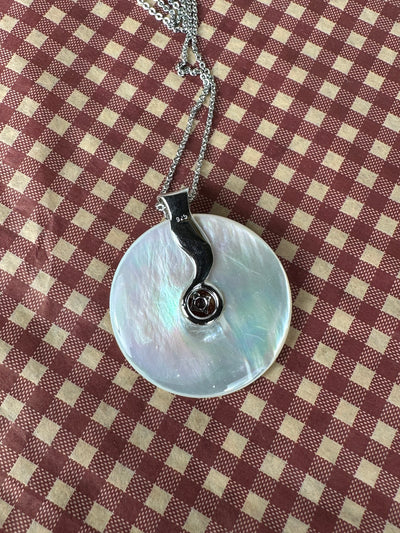 White Shell Pendant Enhanced with Garnet Peridot in Sterling Silver