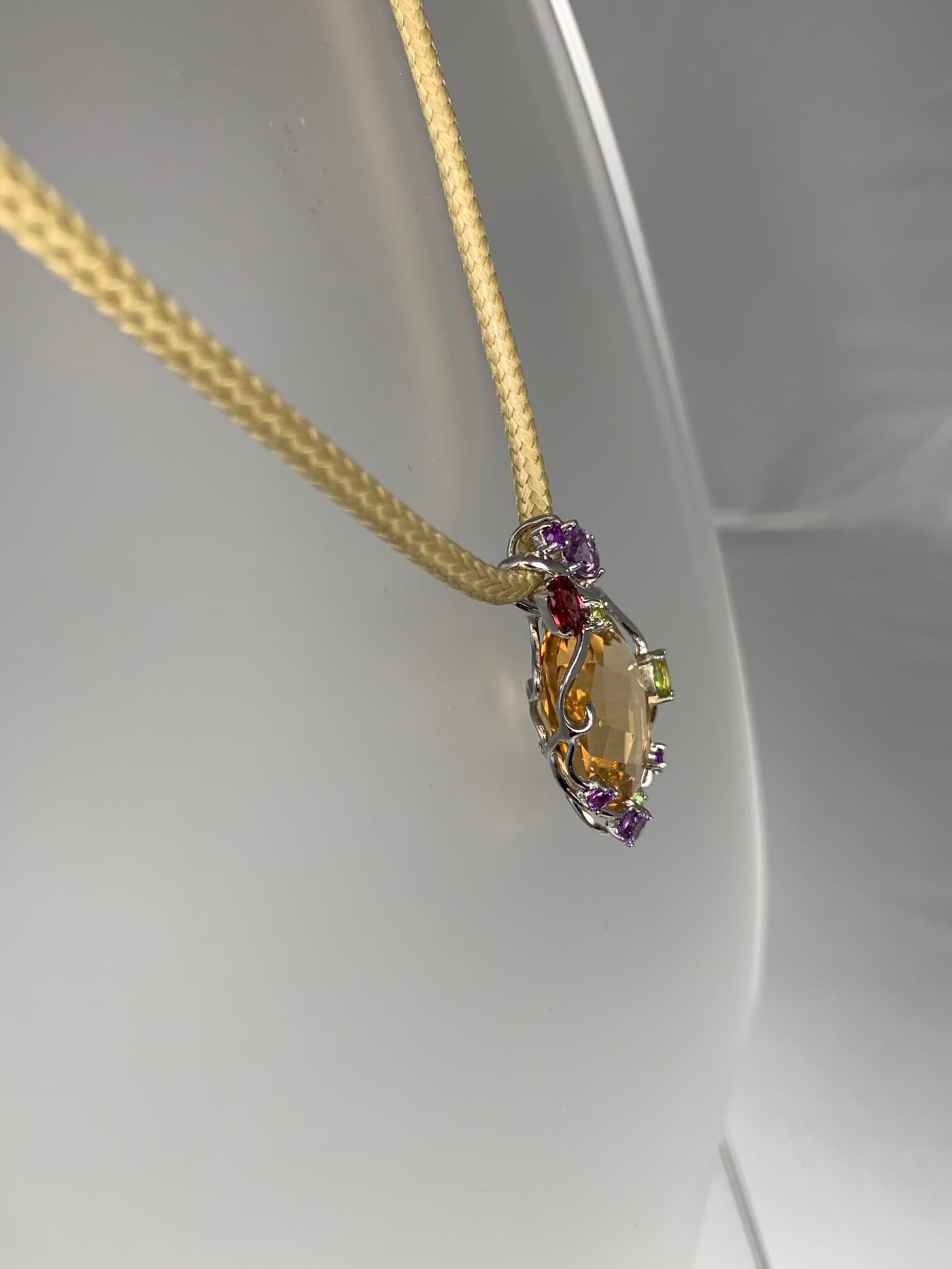 Sterling Silver and Oval "Amber Yellow" CZ Pendant with Genuine Gems Accent