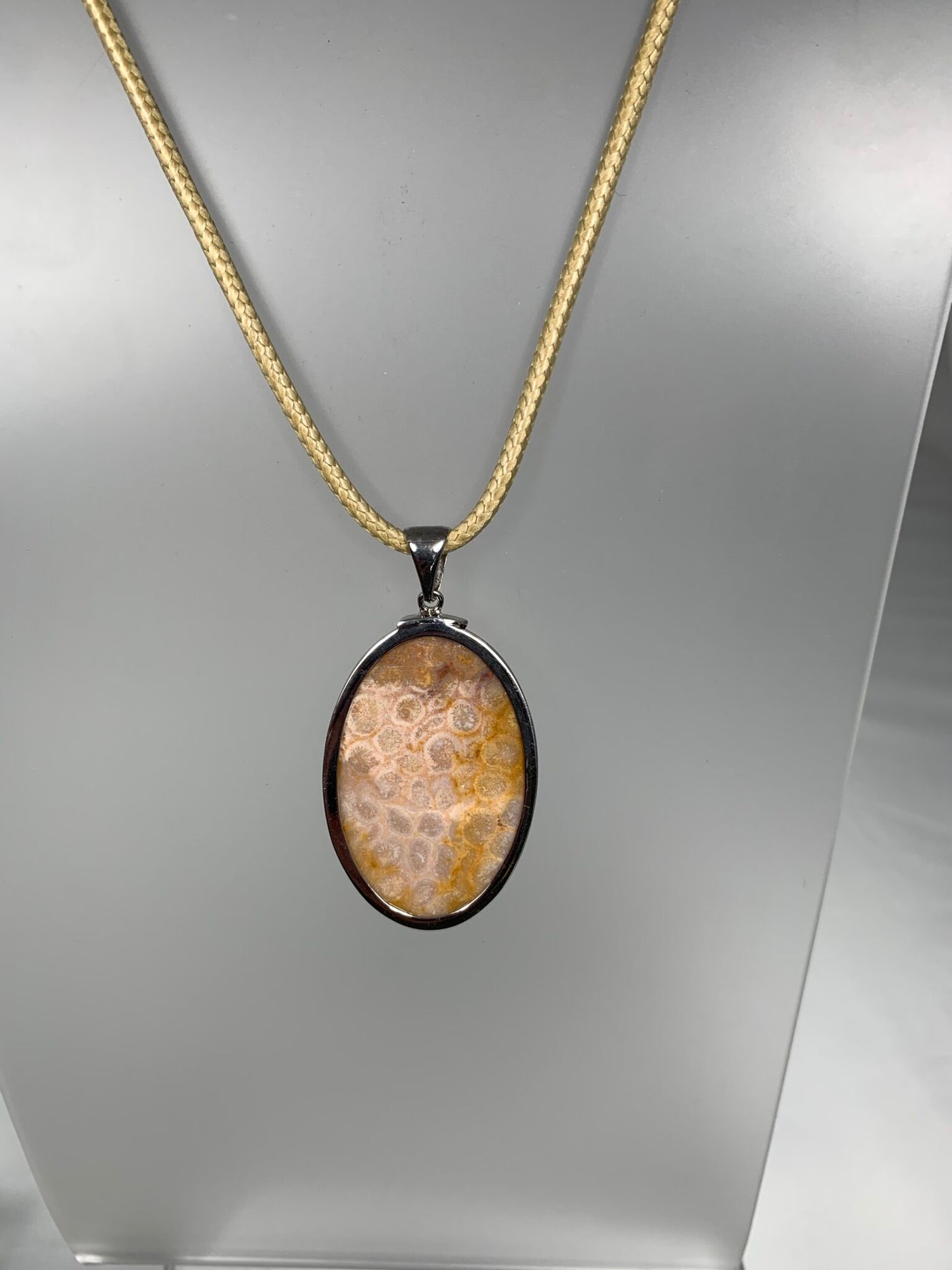 Sterling Silver and Genuine "Medium" Brown Oval Coral Fossil Pendant