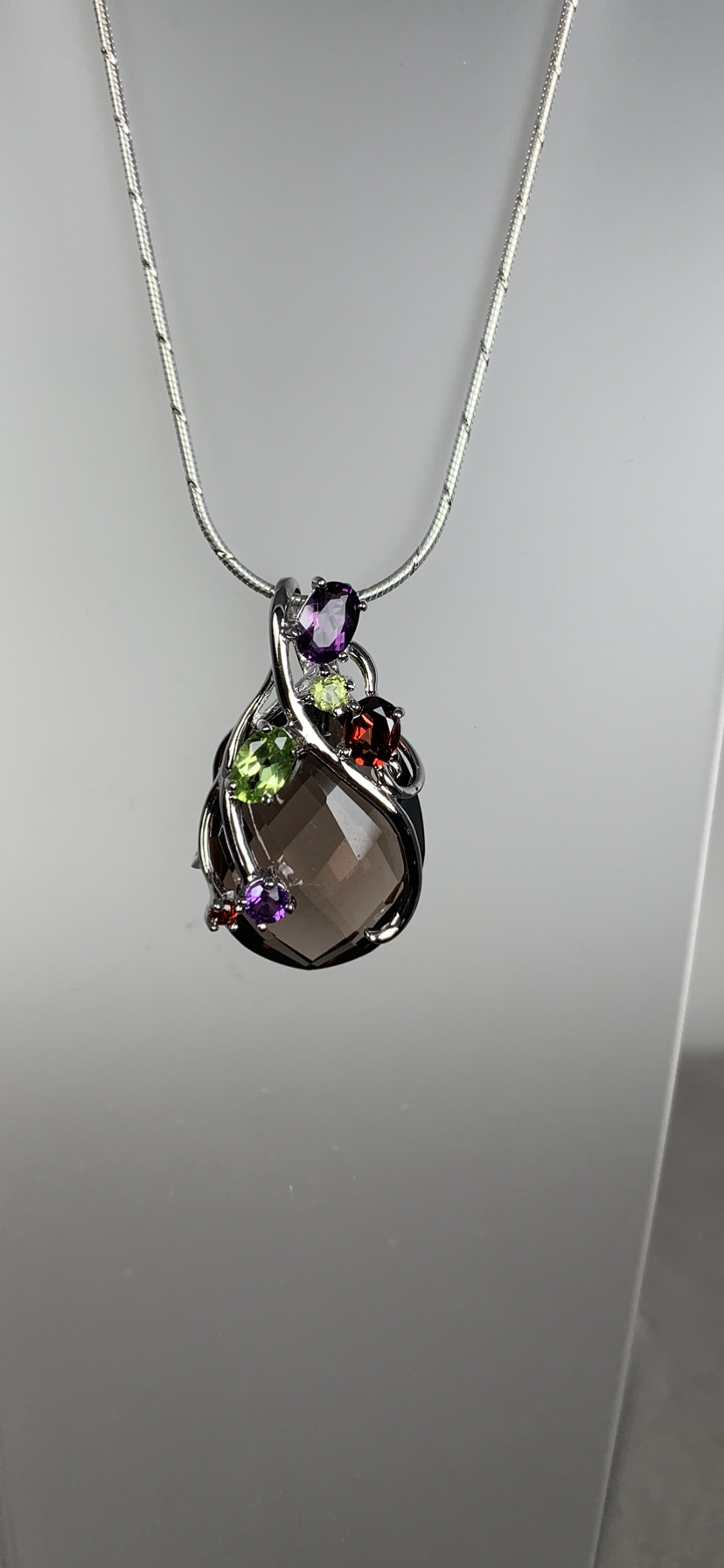 Sterling Silver and Oval Brown Crystal and Genuine Gems Pendant