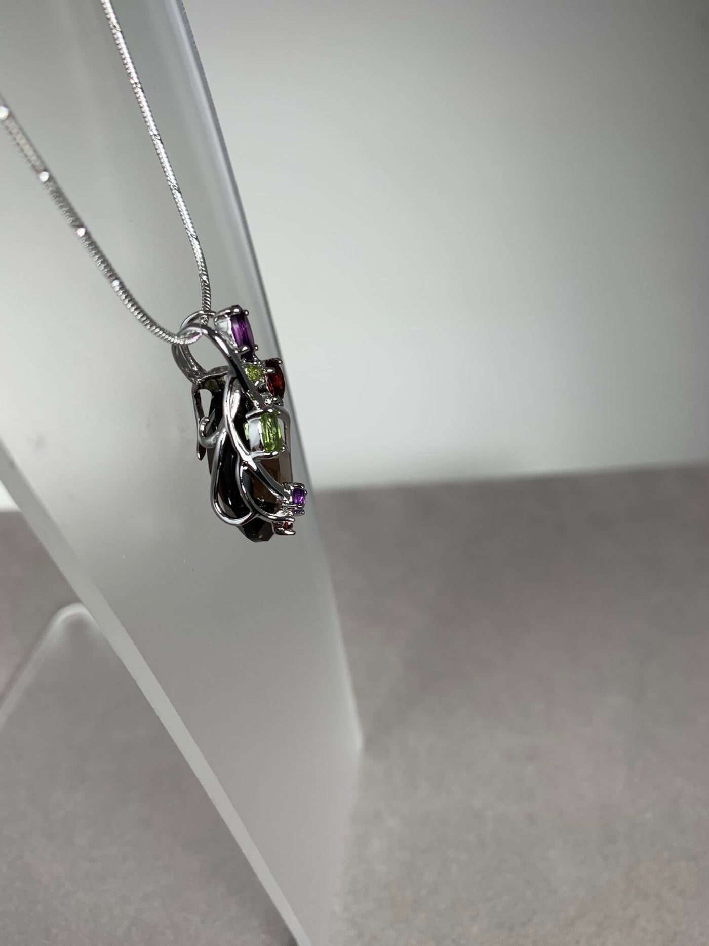 Sterling Silver and Oval Brown Crystal and Genuine Gems Pendant