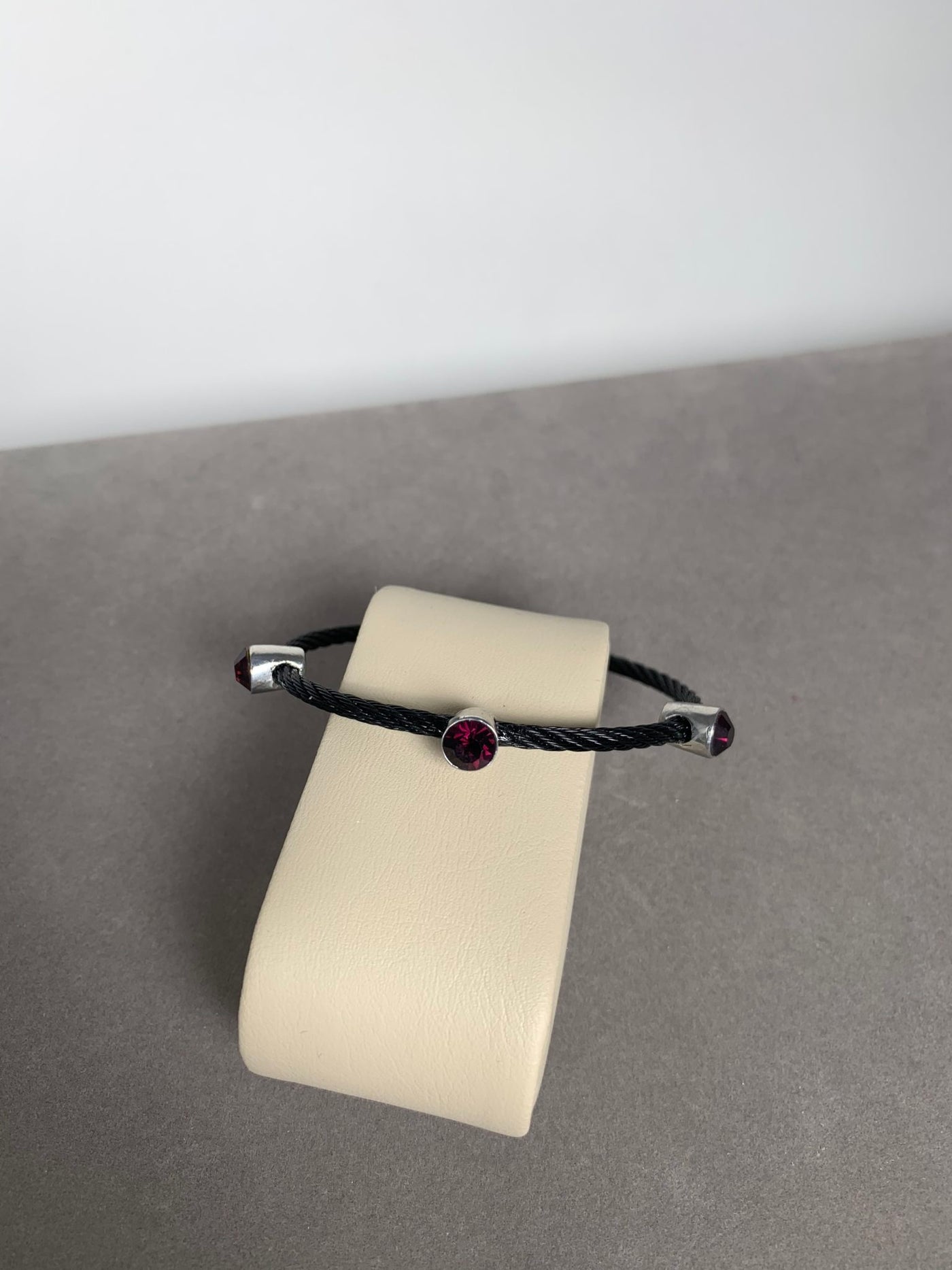Black Wire Bracelet Featuring 3 Deep Purple Crystals
