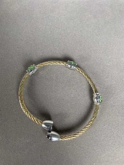 Yellow Gold Tone Wire Bangle Bracelet Features 3 Green Crystal encrusted Barrels