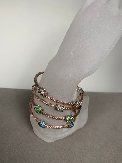 Rose Gold Tone Wire Bangle Bracelet Features 3 Encrusted Clear Crystal Barrels