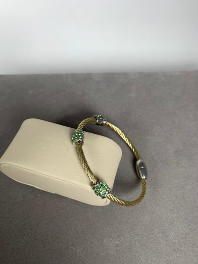 Yellow Gold Tone Wire Bangle Bracelet Features 3 Green Crystal encrusted Barrels