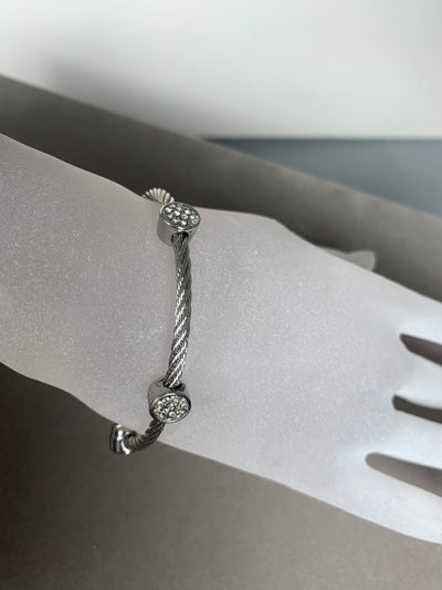 Silver Tone Wire Bangle Bracelet featuring 3 Pave Clear Crystal Round Cups