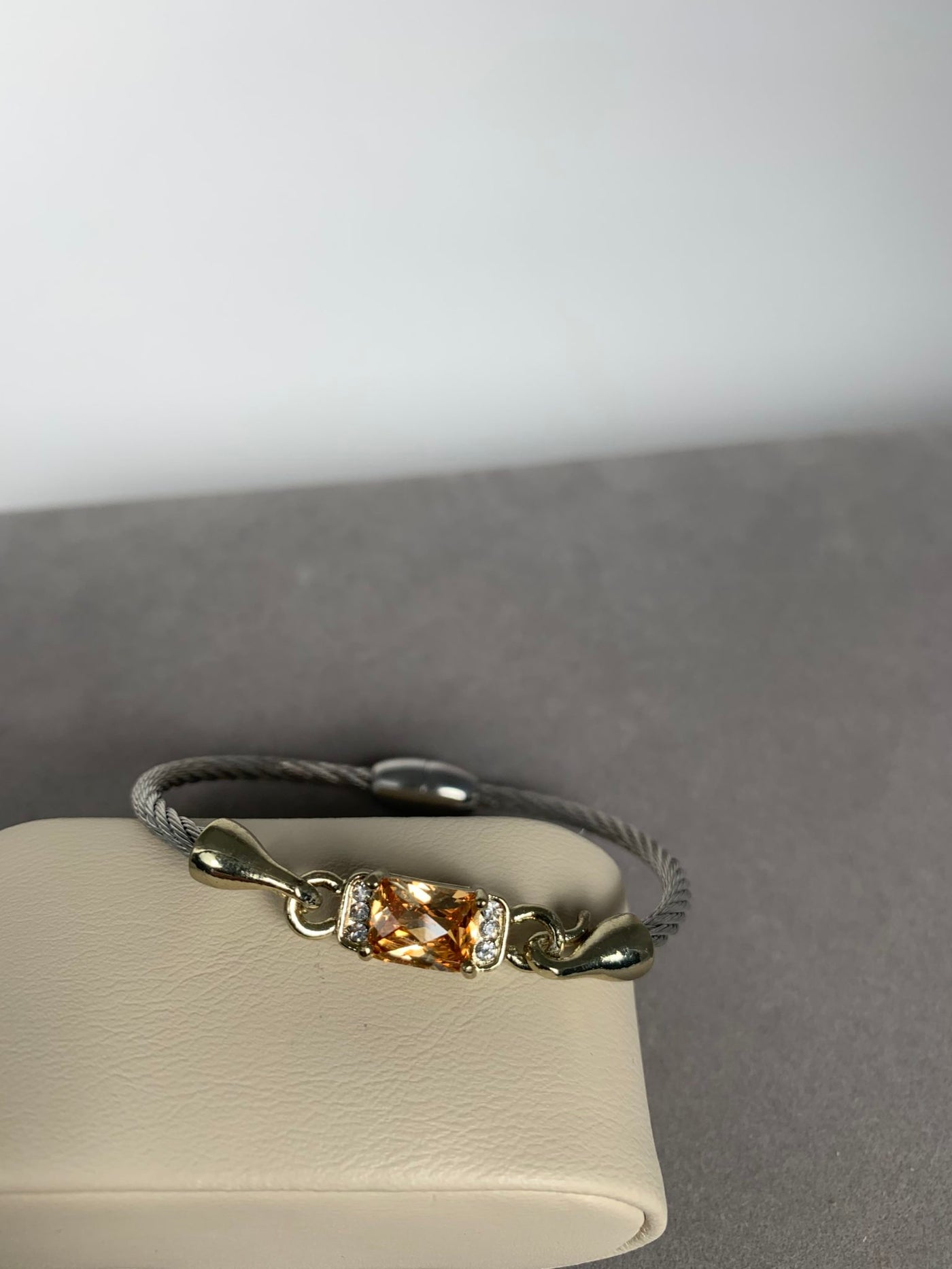 Silver Tone Wire Bangle Bracelet featuring Amber Yellow Crystal