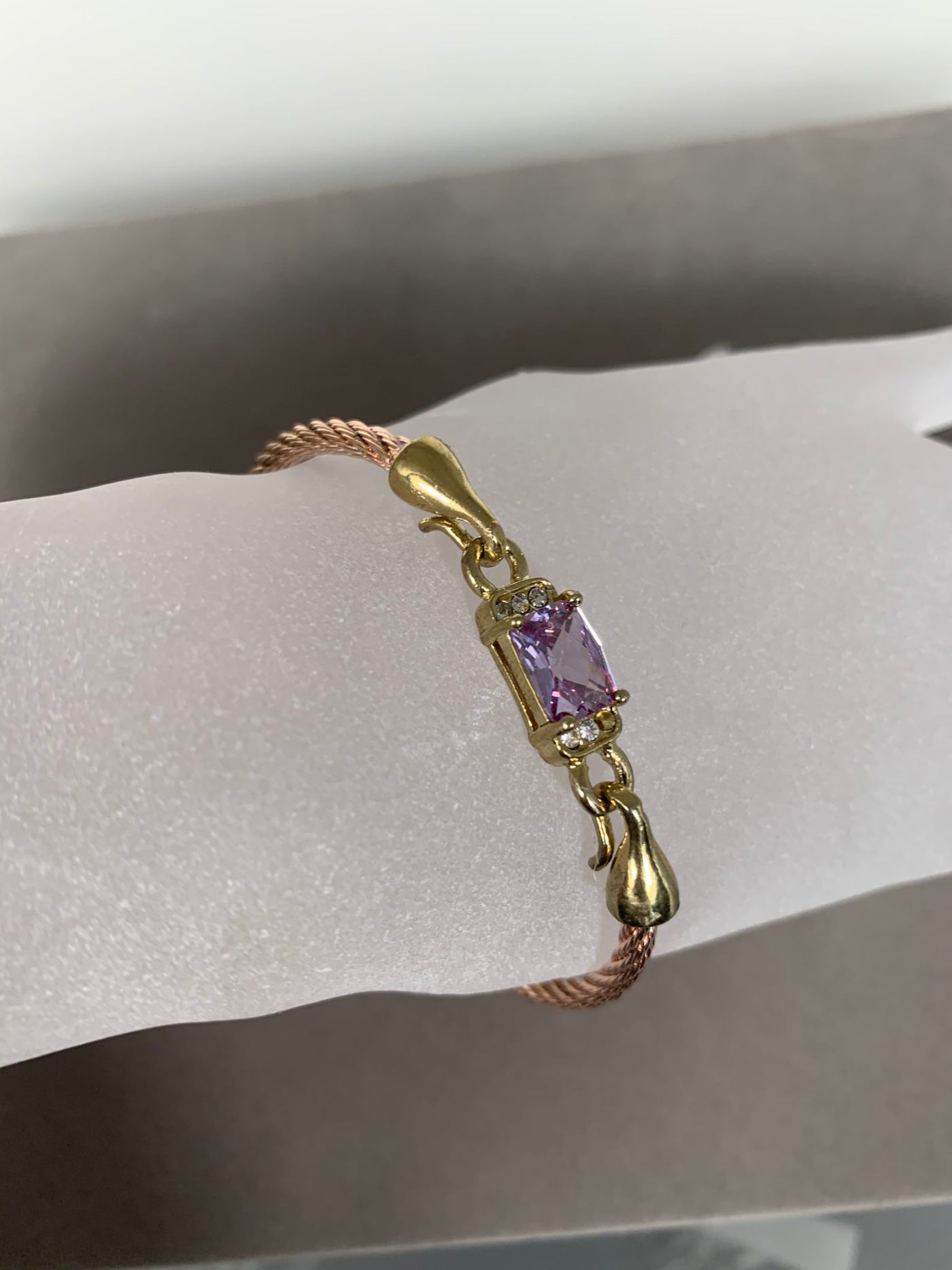 Rose Gold Tone Wire Bangle Bracelet featuring Purple Crystal