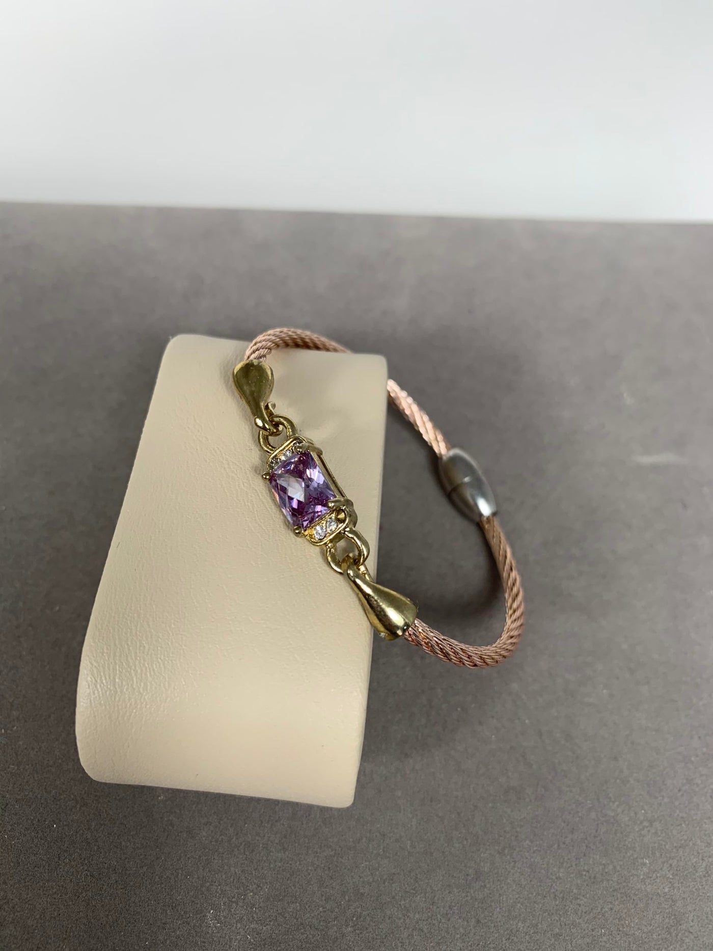 Rose Gold Tone Wire Bangle Bracelet featuring Purple Crystal
