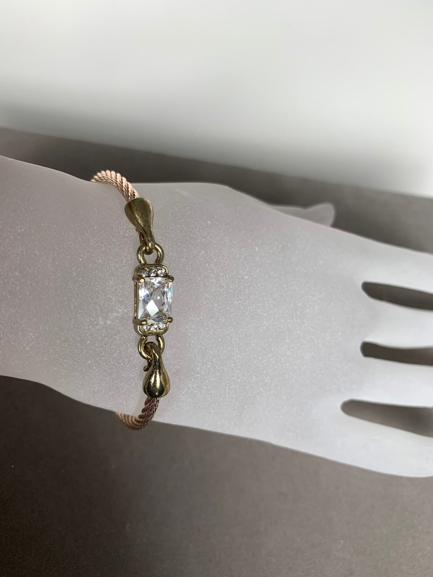 Rose Gold Tone Wire Bangle Bracelet featuring Clear Crystal