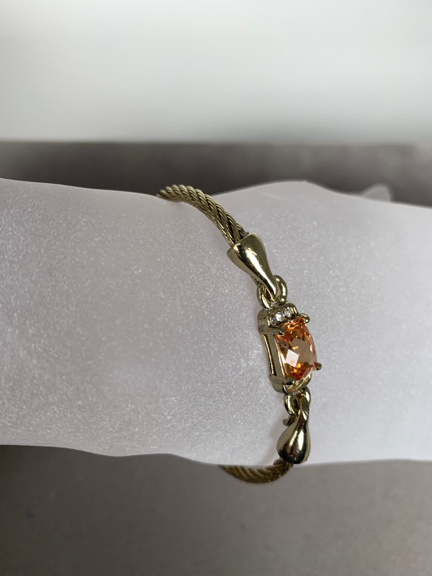 Yellow Gold Tone Wire Bangle Bracelet featuring Amber Yellow Color Crystal
