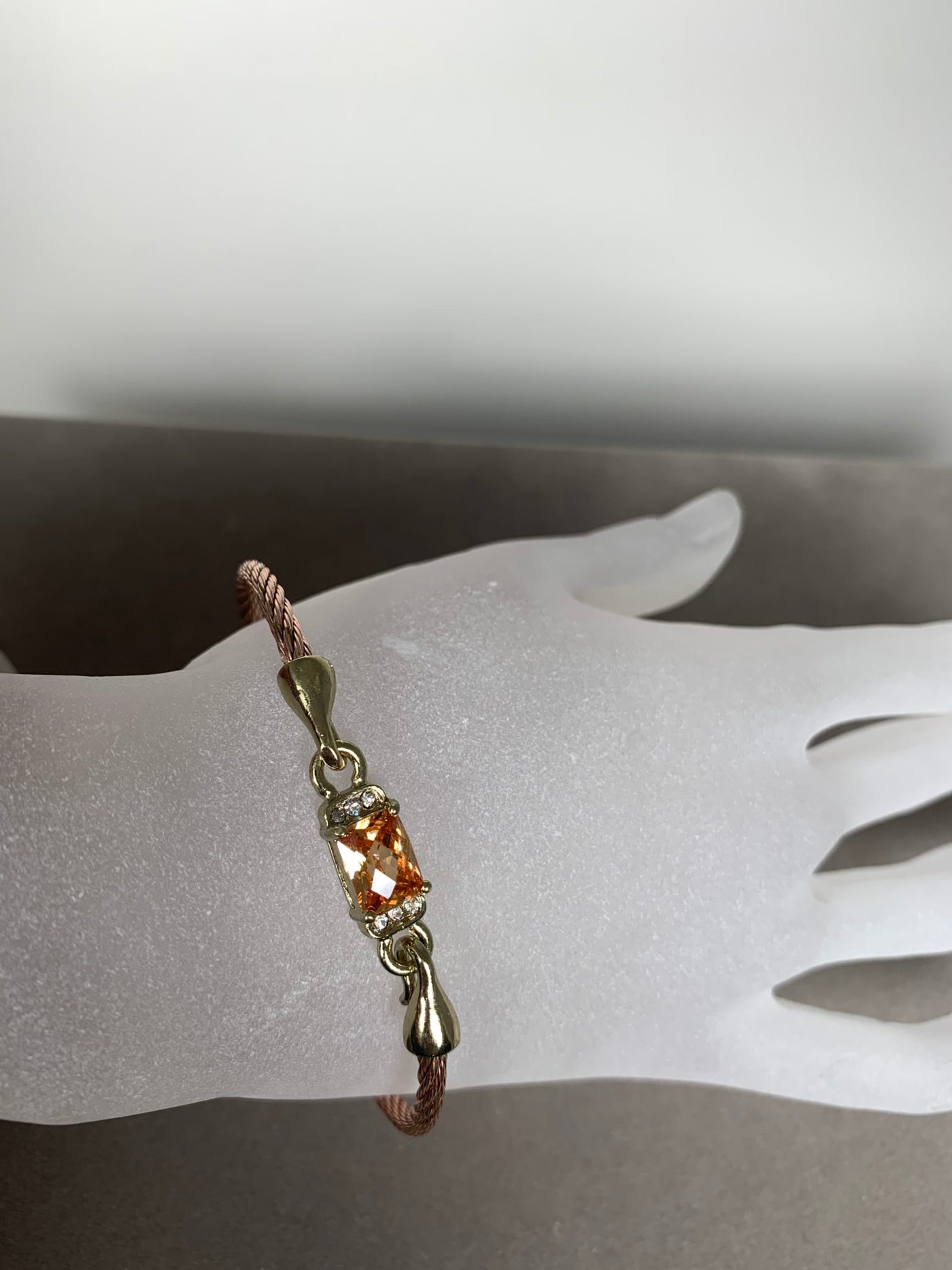 Rose Gold Tone Wire Bangle Bracelet featuring Amber Yellow Color Crystal