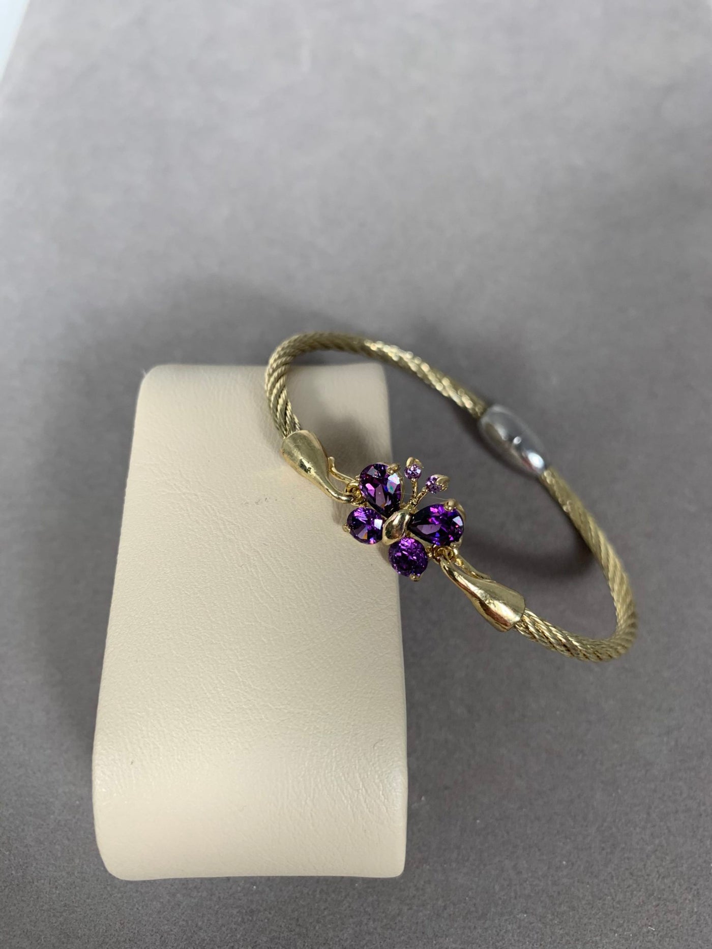 Gold Tone Wire Bangle Bracelet featuring Purple Crystal Butterfly